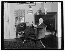 Photo:E.L. Rice 1929 man seated in home interior with radio and furniture picture