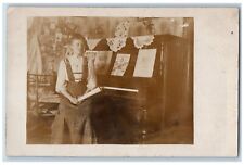 Girl Playing Piano Postcard RPPC Photo Doilies Photo Collection c1910's Antique picture