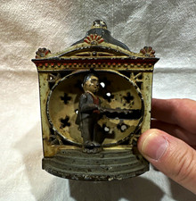 Vintage Cast Iron Mechanical Bank with Figure, Dome Top Building picture