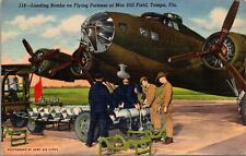 Linen Postcard Loading Bombs on Flying Fortress at Mac Dill Field Tampa Florida picture