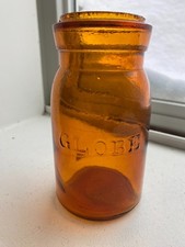 CRUDE AND SWIRLY AMBER GLOBE PINT FRUIT JAR picture
