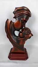Vintage statue by Herco gift of a mother and child In a beautiful bronze color picture