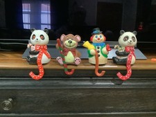 4~ Vintage Plastic CHRISTMAS STOCKING HANGERS HOLDERS  picture