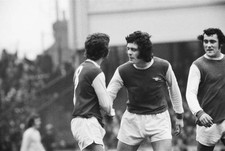 Arsenal midfielder Alan Ball is congratulated by teammates after o- Old Photo picture