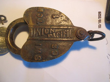 Antique Union Pacific Railroad Lock, buttons and badge group lot picture