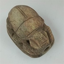 Rare Egyptian scarab with hieroglyphs, unique pharaonic style. picture