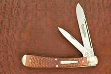 REMINGTON UMC USA BULLET KNIFE JIGGED DELRIN JUMBO BANANA TRAPPER 1995 (33085) picture