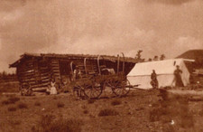 RPPC Real Photo Postcard - Pioneers Covered Wagon Log Cabin Tent Cowboys c1910 picture