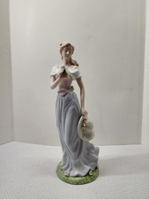 Avon Moments and Memories Kathleen A Spring Stroll Figurine picture
