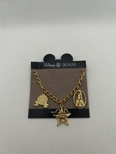 Walt Disney World Gold Tone Charm Bracelet Disney Designs Made in USA Card picture