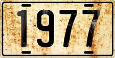 Dodge, Ford or Chevrolet antique vehicle 1977 Weathered License plate picture