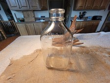 VINTAGE We Serve All Half Gal. Milk Bottle Saginaw Michigan picture