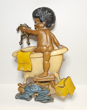 Cast Metal 1970's Vintage Wall Art Of African Boy With Frog Taking A Bath picture
