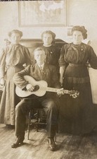 RPPC Family Of Musicians Man With Guitar And Piano In Background Postcard picture