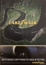 2011 Goodyear Assurance Tires PRINT AD Comforted Touring Curvy Road - Cake Walk picture