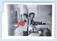 PHOTO Gemini women in the kitchen Christmas evening weird picture