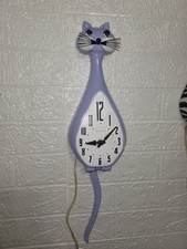 Rare 50s/60s Spartus Here Kitty Purple Inviolet Kitty clock. Working tail/eyes. picture