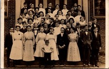 RPPC Group Portrait Outside Brick Building Vintage Postcard 4P24-26 picture