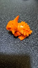 Ultra Kaiju Eraser, Orange Spiky Monster Figure, Collectible Toy picture