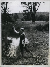 1934 Press Photo Boxer Jimmy McLarnin trains & fishes at Orangeburg NY picture