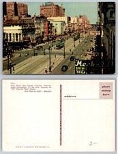 Canal Street New Orleans Louisiana Street View Trolley Cars Postcard picture