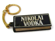 Vintage Keychain: Nikolai Vodka Address Telephone Book (Pin Missing) picture