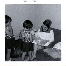 Vintage 1968 Black & White Photo Woman and Two Girls Opening Gift picture