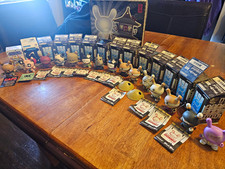 Kidrobot Huck Gee Gold Life Dunny 2011 Collection – 14 Figures with Display Box picture