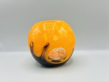 Hand Blown Glass Candle Holder with Swirl Design Orange Black Decorative Pebbles picture