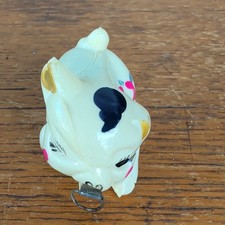 Vintage Figural Celluloid Sewing Tape Measure Winking Pig with Flowers Japan picture