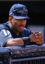 Anaheim Angels outfielder Garret Anderson leans on the dugout rail- Old Photo picture