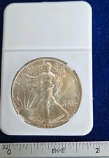 U.S. Mint 1986 $1 American Silver Eagle 1 oz Silver Business Strike Uncert picture