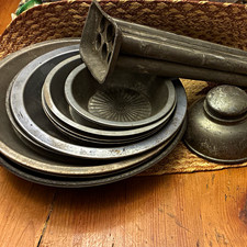 Primitive Tin collection. Old pie tins and tin ink well and old tin candle mold  picture