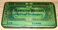 HAMILTON WATCH CO., THE RAILROAD TIMEKEEPER'S, TIN LITHO MAINSPRING TIN picture