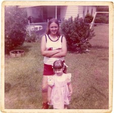 Vtg 1970s Found Photo Sisters Posing Back Yard Snapshot picture