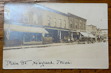 Vintage Main St Street Wayland Michigan MI Cars Flag RPPC Real Photo Postcard picture