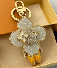 Cute Flower Doll Keychain Bag Charm Gold Tone with Sparkling Crystals picture