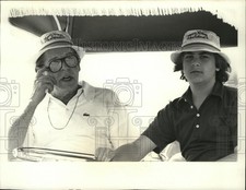 1976 Press Photo Miltin Berle and son Bill ride cart during round of golf picture