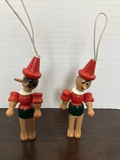 Title: Vintage Pair of Hand-Painted Wooden Pinocchio Hanging Ornaments  picture