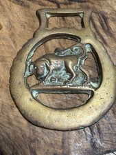 Vintage Brass Horse Medallion with Bull Figure picture