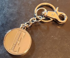 Vintage ELLE Magazine Silver Finish Metal Key Ring / Key Chain picture