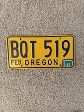 Vintage 1970s-80s Oregon License Plate BQT 519 Yellow Blue w/ 1982 Tag picture