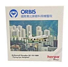 Herpa 500128 1:500 Scale ORBIS Flying Eye Hospital DC10 10ER Diecast Plane Boxed picture