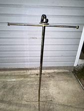 This is a vintage Silver Metal Decorative clothing wrack picture