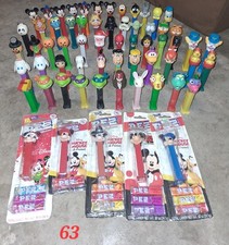 Lot Of 63 PEZ Dispensers With Feet Cartoons, Action Heroes, Holiday Characters picture