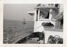 Vintage Photo Seasick Woman Fishing Boat Amused Friends Buoy Ocean Sunglasses picture