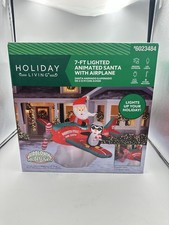 Holiday Living 9.1 ft Animatronic Lighted Christmas Inflatable Santa Air Show picture