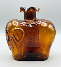 Vintage Amber Glass Elephant Bottle Likely Clevenger Bros. picture