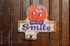SMILE ORANGE SODA STAMPED PAINTED METAL PLATE TOPPER SIGN VINTAGE 1950s SUNSHINE picture