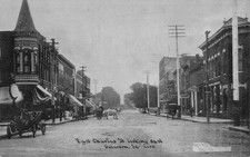 Oelwein Iowa East Charles Street Town View Cars Horse Carts Postcard picture